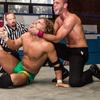 Chet Sterling applies the chinlock on ROH Superstar Adam Page